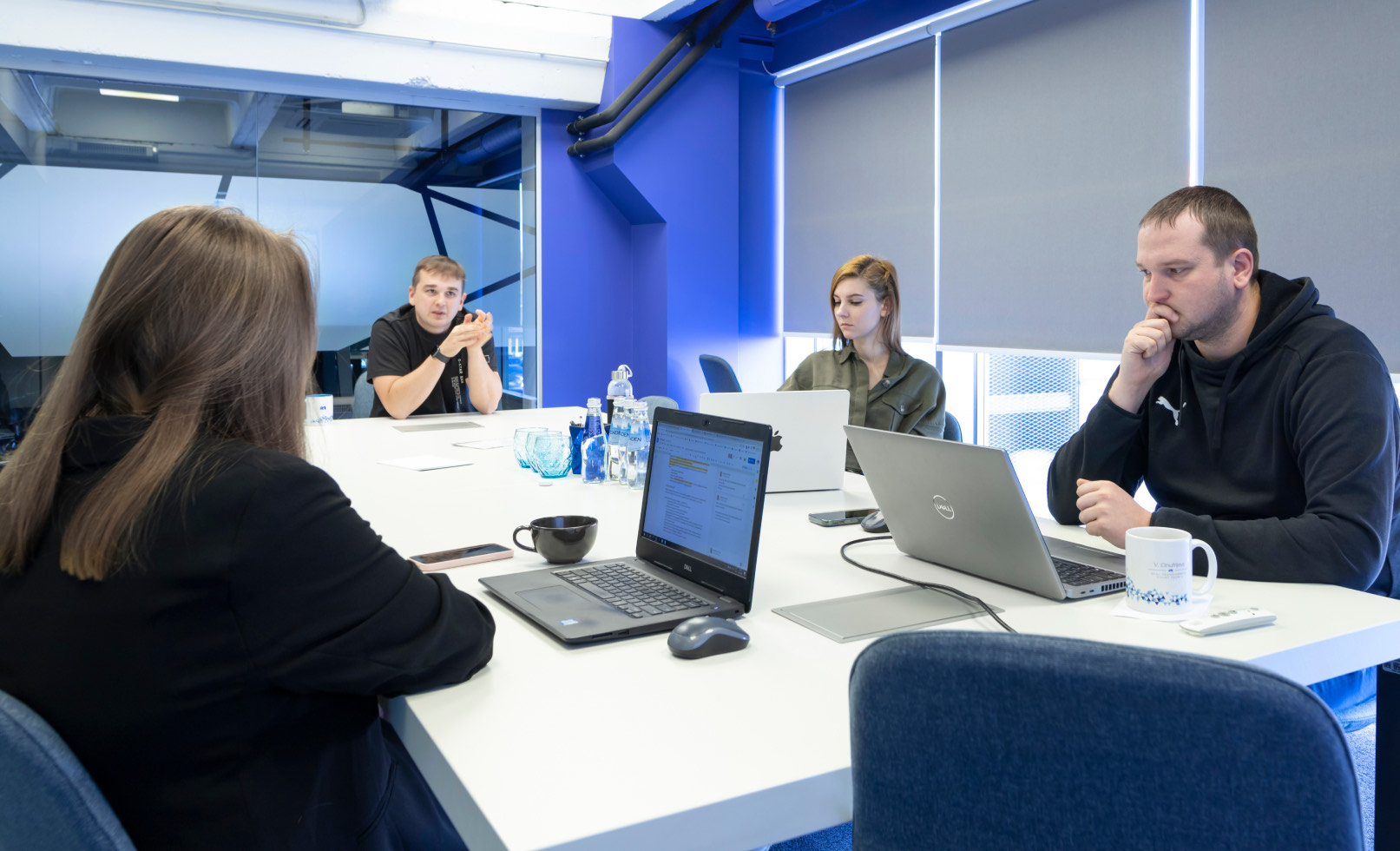 The Velocity Lab team in a meeting at the Riga office